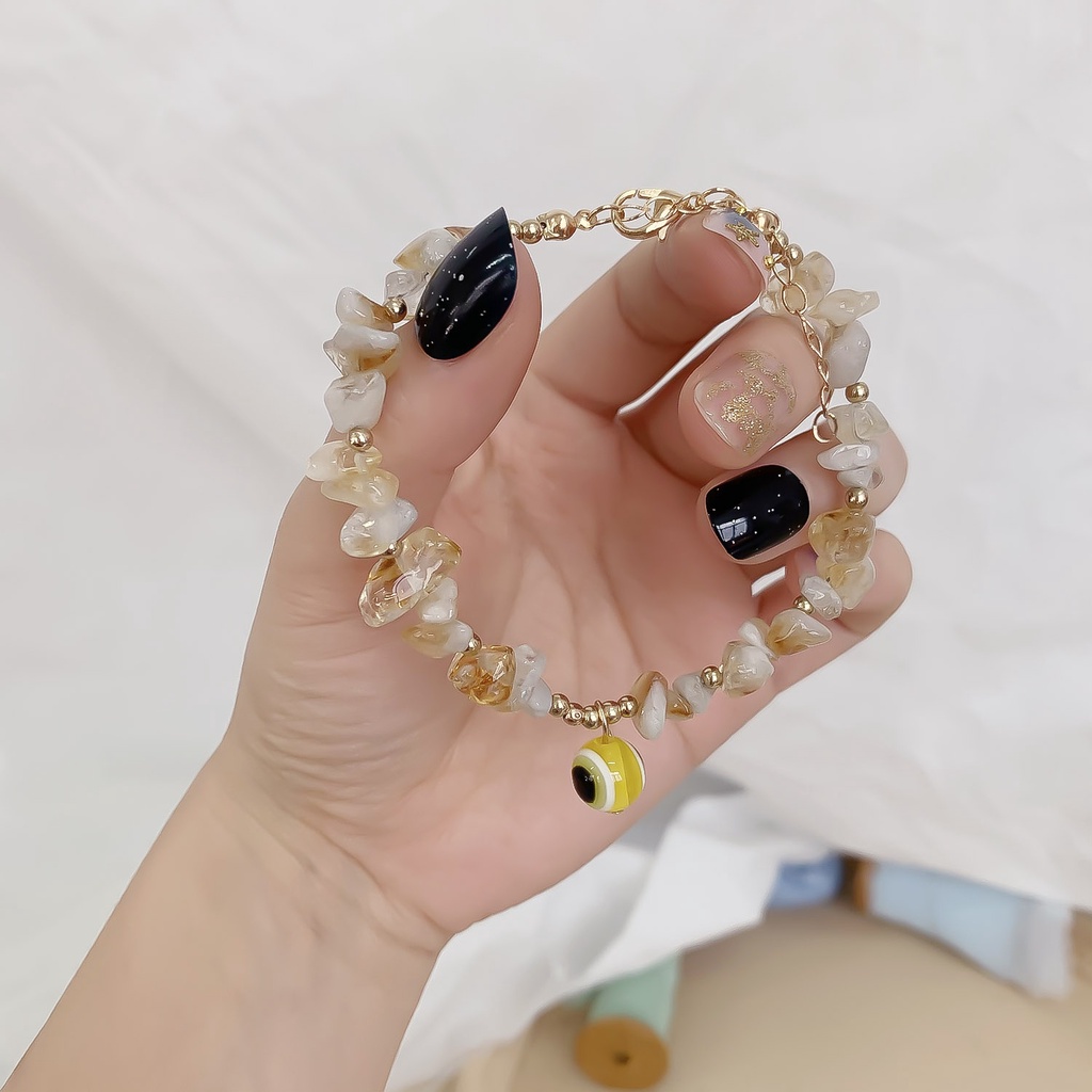 Vòng tay đá handmade mắt quỷ vàng