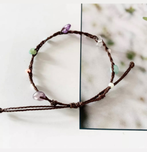 Vòng tay đá handmade  dây sáp màu nâu